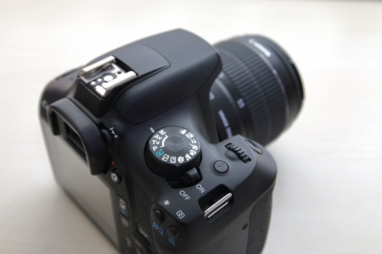 Canon EOS 1300D mode dial and top panel